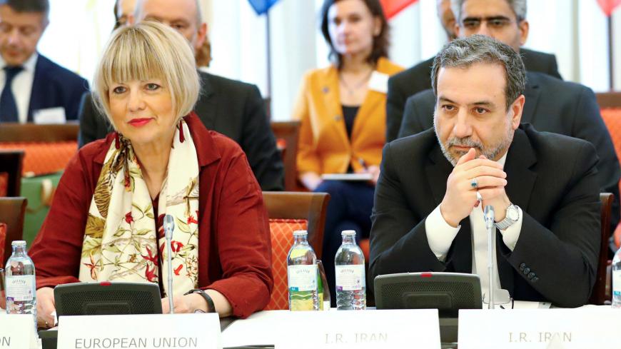 REFILE - CORRECTING SPELLING OF SURNAME  Iran's top nuclear negotiator Abbas Araqchi and Secretary General of the European External Action Service (EEAS) Helga Schmid attend a meeting of the JCPOA Joint Commission in Vienna, Austria,  June 28, 2019.  REUTERS/Leonhard Foeger - RC1A82E0A620