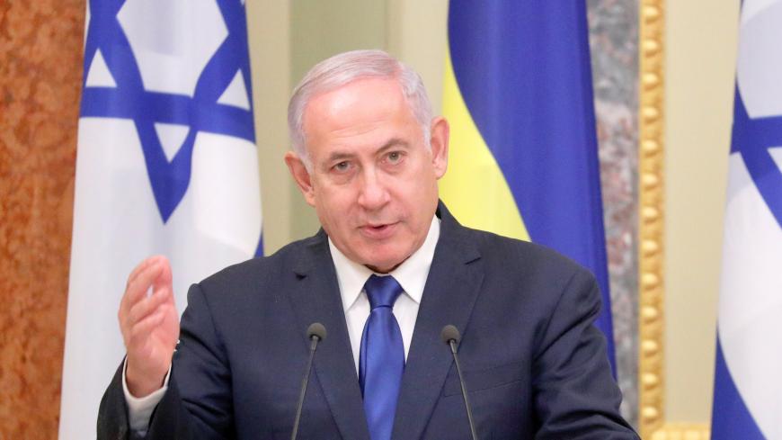 Israeli Prime Minister Benjamin Netanyahu speaks during a news briefing following the talks with Ukrainian President Volodymyr Zelenskiy in Kiev, Ukraine August 19, 2019. REUTERS/Valentyn Ogirenko - RC1613F3F6B0