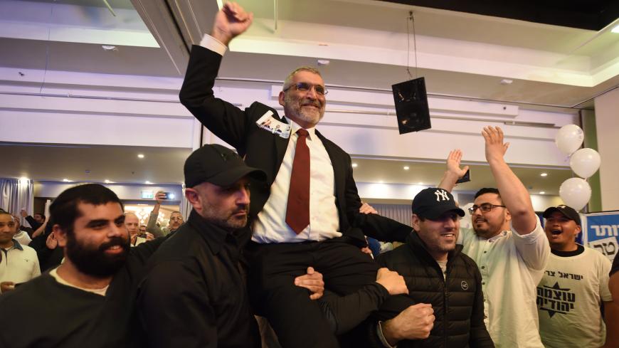 Israeli extreme right-wing activist Dr. Micael Ben-Ari, leader of Otzma Yehudit party is carried by supporters at the party's election campaign event in Bat Yam on April 06, 2019.  (Photo by Gili Yaari/NurPhoto via Getty Images)