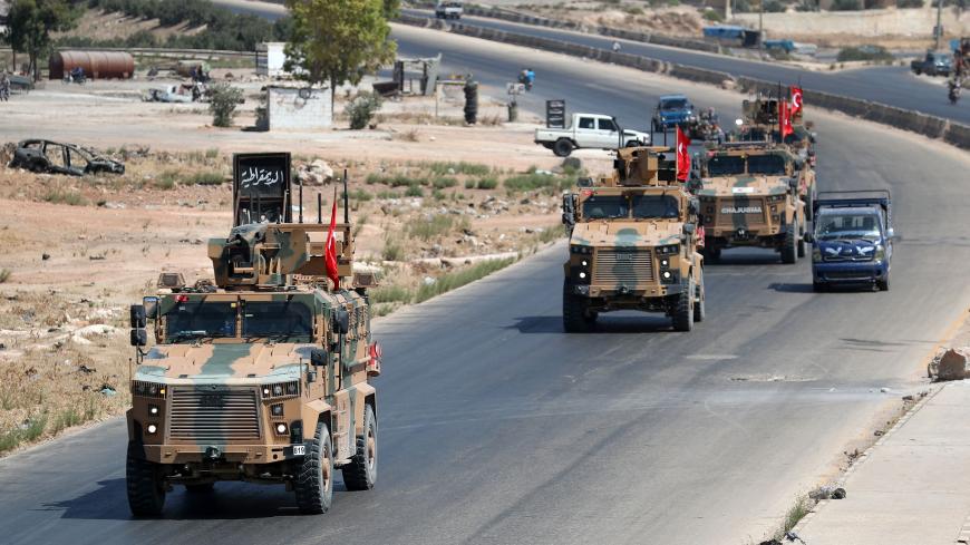 Turkish military vehicles patrol near the Syrian town of Saraqeb in the northwestern province of Idlib on September 4, 2019. (Photo by Omar HAJ KADOUR / AFP)        (Photo credit should read OMAR HAJ KADOUR/AFP/Getty Images)