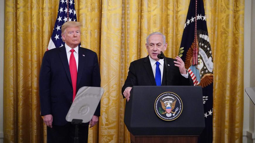 US President Donald Trump and Israeli Prime Minister Benjamin Netanyahu take part in an announcement of Trump's Middle East peace plan in the East Room of the White House in Washington, DC on January 28, 2020. - Trump declared that Israel was taking a "big step towards peace" as he unveiled a plan aimed at solving the Israeli-Palestinian conflict. "Today, Israel takes a big step towards peace," Trump said, standing alongside Netanyahu as he revealed details of the plan already emphatically rejected by the P