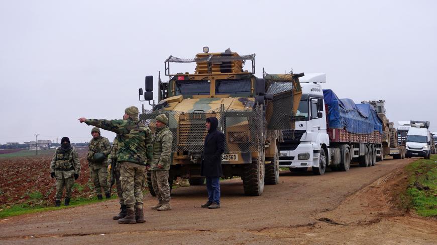 Turkish military vehicles are pictured in the town of Binnish in Syrias northwestern province of Idlib, near the Syria-Turkey border on February 12, 2020. - Russian President Vladimir Putin and Turkish leader Recep Tayyip Erdogan discussed de-escalation of the Syrian crisis, saying Russian-Turkish agreements should be implemented in full, the Kremlin said."The importance was noted of the full implementation of existing Russian-Turkish agreements," the Kremlin said in a statement after the Putin-Erdogan phon