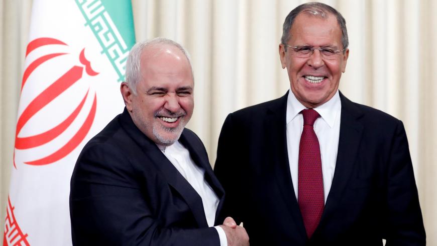 Russia's Foreign Minister Sergei Lavrov and his Iran's counterpart Javad Zarif shake hands after a news conference following their meeting in Moscow, Russia, September 2, 2019. REUTERS/Evgenia Novozhenina? - RC1701538170