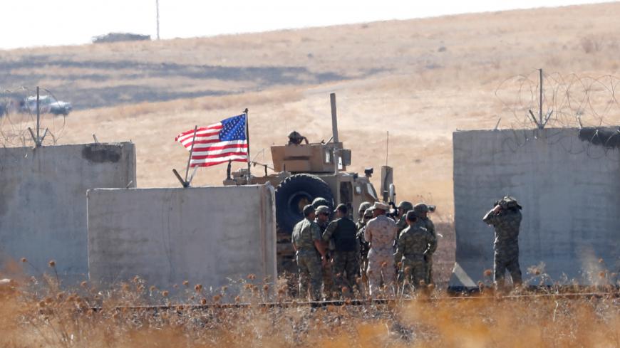 Turkish and U.S. troops meet on the Turkish-Syrian border for a joint U.S.-Turkey patrol in northern Syria, as it is pictured from near the Turkish town of Akcakale, Turkey, September 8, 2019. REUTERS/Murad Sezer - RC1D2B26B2A0