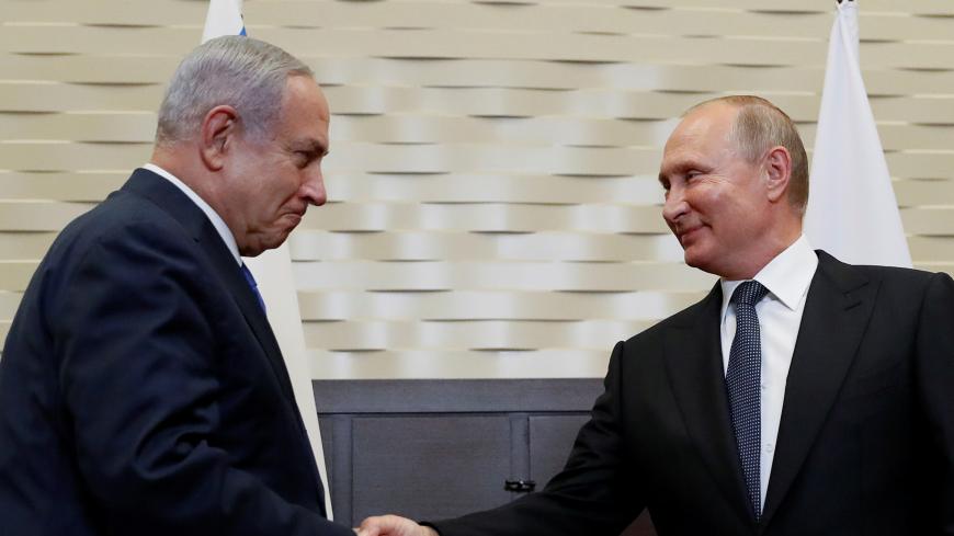 Russian President Vladimir Putin shakes hands with Israeli Prime Minister Benjamin Netanyahu during a meeting at the Bocharov Ruchei state residence in Sochi, Russia September 12, 2019. REUTERS/Shamil Zhumatov - RC1C716EE3D0