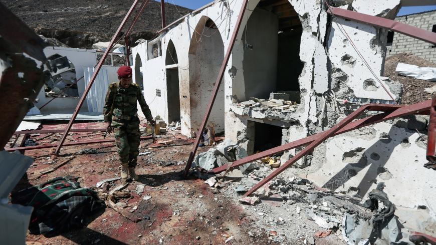 A soldier walks at the site of a Houthi missile attack on a military campís mosque in Marib, Yemen January 20, 2020. REUTERS/Ali Owidha - RC2OJE90YU7S