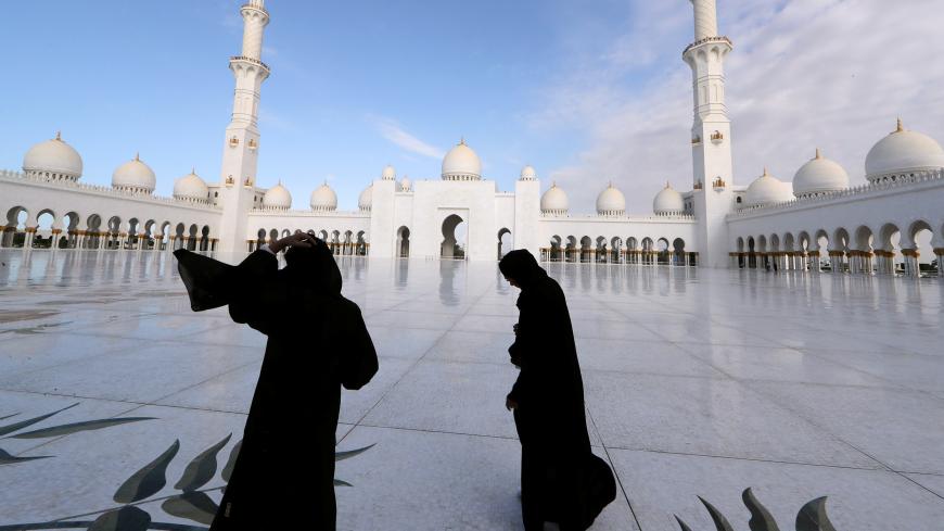 Women are seen at Shaikh Zayed Grand Mosque before a visit by Pope Francis in Abu Dhabi, United Arab Emirates, February 4, 2019. REUTERS/Tony Gentile - RC187AF4AC70