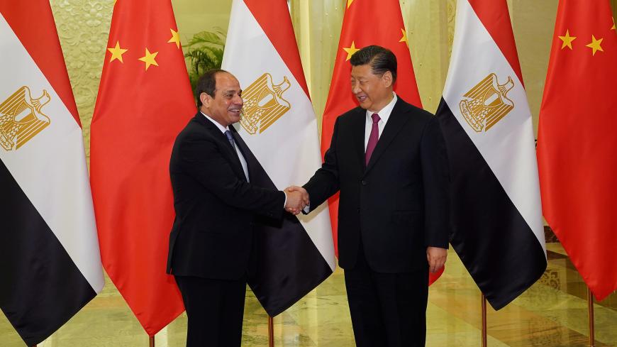Chinese President Xi Jinping shakes hands with Egypt's President Abdel Fattah El-Sisi before a bilateral meeting of the Second Belt and Road Forum at the Great Hall of the People, in Beijing, China  April 25, 2019. Andrea Verdelli/Pool via REUTERS  *** Local Caption *** BEIJING, CHINA - APRIL 25: Egypt President Abdel Fattah El-Sisi talks to Chinese President Xi Jinping (not pictured) during a bilateral meeting of the Second Belt and Road Forum at the Great Hall of the People on April 25, 2019 in Beijing, C