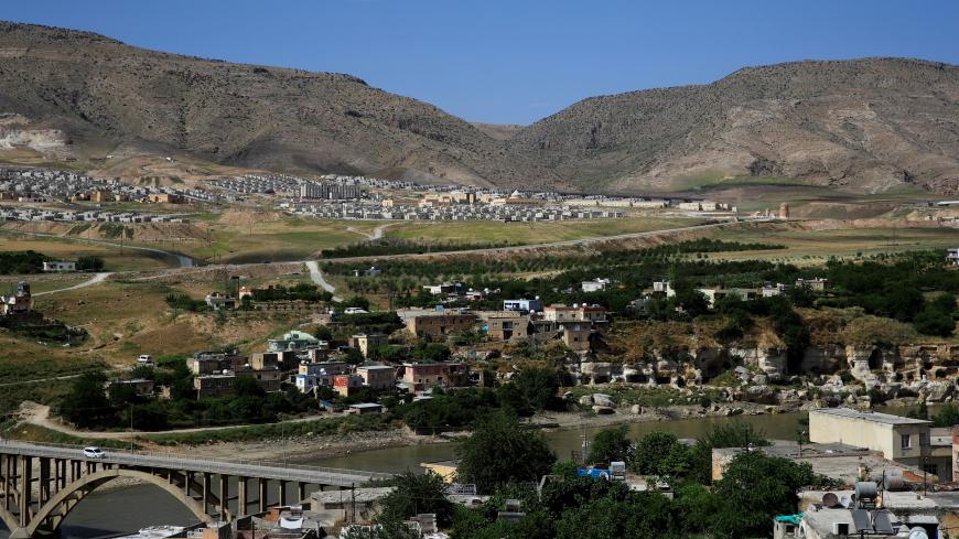 View of old Hasankeyf, which will be significantly submerged by the Ilisu dam being constructed, with the new Hasankeyf in the background in the southeastern town of Hasankeyf, Turkey, June 1, 2019. Picture taken June 1, 2019. REUTERS/Umit Bektas - RC12E749C880