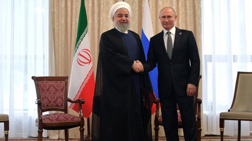 Russia's President Vladimir†Putin†and Iran's President†Hassan†Rouhani attend a meeting on the sidelines of the Shanghai Cooperation Organisation (SCO) summit in Bishkek, Kyrgyzstan June 14, 2019. Sputnik/Alexei Druzhinin/Kremlin via REUTERS ATTENTION EDITORS - THIS IMAGE WAS PROVIDED BY A THIRD PARTY. - RC1D5F7AAE10