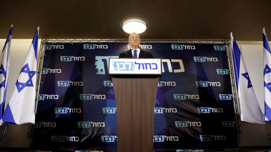 Benny Gantz, leader of Blue and White, delivers a statement before his party faction meeting in Tel Aviv, Israel September 19, 2019. REUTERS/Amir Cohen - RC14F42F05E0