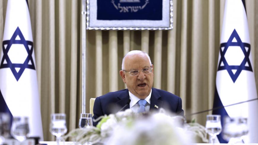 Israeli President Reuven Rivlin speaks as he meet members of the Likud Party as he began talks with political parties over who should form a new government, at his residence in Jerusalem September 22, 2019. Menachen Kahana/Pool via REUTERS - RC1352568060