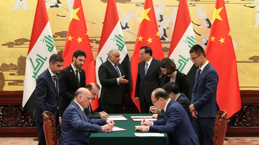 Chinese Premier Li Keqiang attends a signature ceremony with Iraqi Prime Minister Adil Abdul-Mahdi at the Great Hall of the People, in Beijing, China September 23, 2019. Lintao Zhang/Pool via REUTERS *** Local Caption *** Li Keqiang; Adil Abdul-Mahdi - RC1DE0BB6230