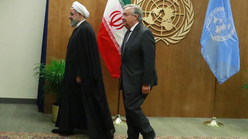 Iran's President Hassan Rouhani walks with United Nations Secretary General Antonio Guterres as they meet on the sidelines of the 74th session of the United Nations General Assembly at U.N. headquarters in New York City, New York, U.S., September 25, 2019. REUTERS/Yana Paskova - HP1EF9P1DL8HJ