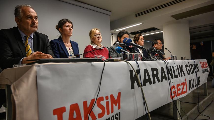 Members and spokeswoman Mucella Yapici (3rd L) of Taksim solidarity platform attend a press conference on March 11, 2019 in Istanbul. - Turkish activists at the forefront of the mass 2013 anti-government protests on March 11, 2019, rejected "irrational" and "unlawful" indictment targeting prominent Turkish businessman Osman Kavala and 15 others. (Photo by Ozan KOSE / AFP)        (Photo credit should read OZAN KOSE/AFP/Getty Images)