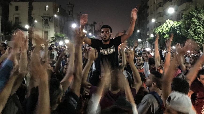21 September 2019, Egypt, Cairo: Protesters shout slogans during a rare anti-government protest in Downtown Cairo. (Best quality available) Photo: Oliver Weiken/dpa (Photo by Oliver Weiken/picture alliance via Getty Images)