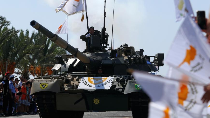 Cypriot army armoured vehicles participate in a military parade marking Cyprus' Independence Day in Nicosia, Cyprus October 1, 2018. REUTERS/Yiannis Kourtoglou - RC17D08F54F0