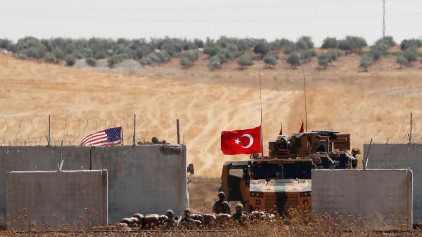 Turkish and U.S. troops return from a joint U.S.-Turkey patrol in northern Syria, as it is pictured from near the Turkish town of Akcakale, Turkey, September 8, 2019. REUTERS/Murad Sezer - RC1246867E60