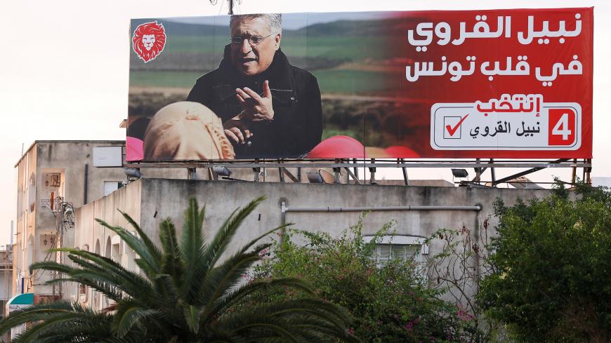 A views shows an election campaign billboard of presidential candidate, Tunisian media mogul Nabil Karoui, in Tunis, Tunisia, September 11, 2019. Picture taken September 11, 2019. REUTERS/Zoubeir Souissi - RC158B0C7260