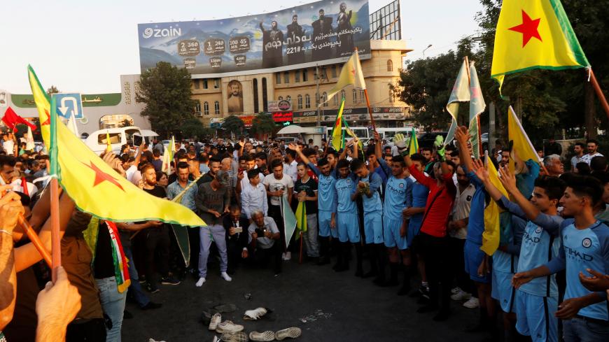 Kurds protest the Turkish offensive against Syria during a demonstration in Sulaimaniyah, Iraq October 10, 2019. REUTERS/Ako Rasheed - RC194B74F820