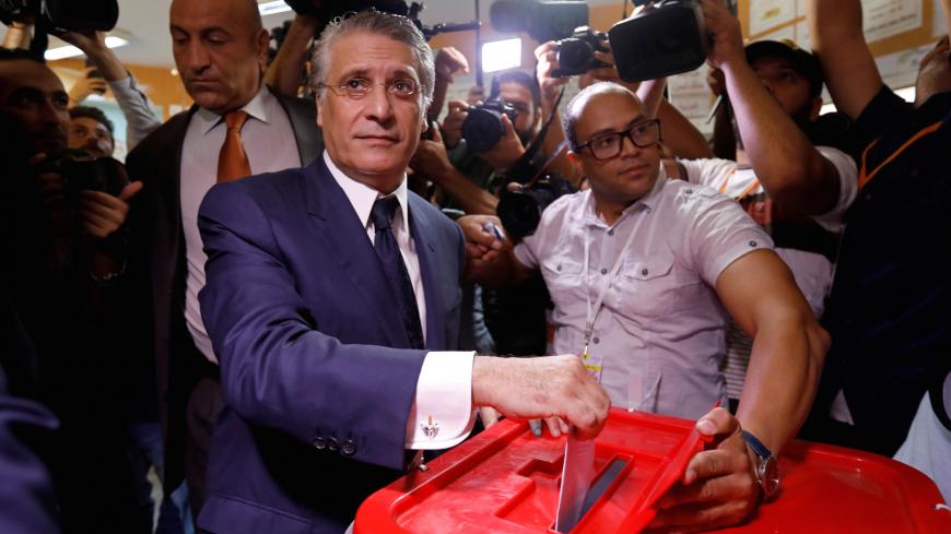Tunisian presidential candidate Nabil Karoui casts his vote at a polling station during a second round runoff of a presidential election in Tunis, Tunisia October 13, 2019. REUTERS/Zoubeir Souissi - RC12A0A2F020