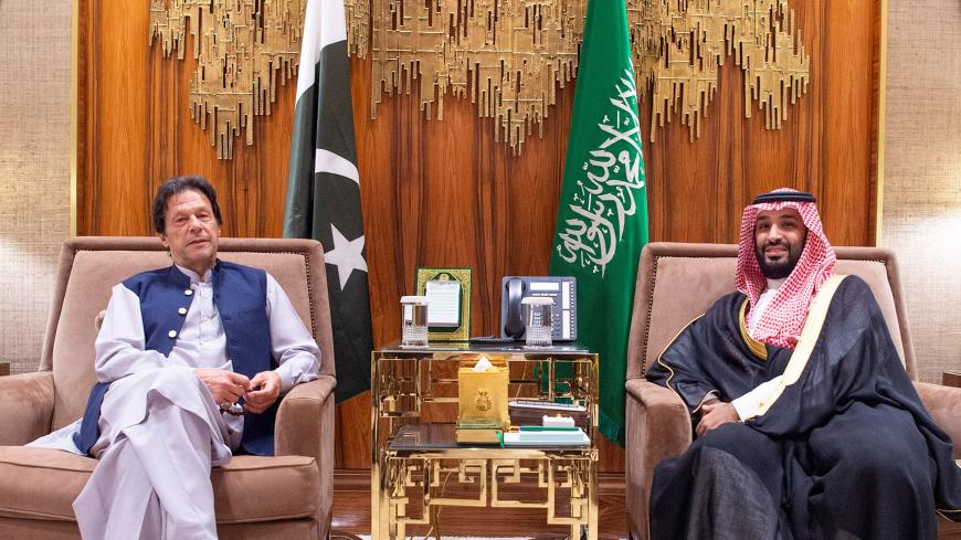 Saudi Arabia's Crown Prince Mohammed bin Salman meets with Pakistani Prime Minister Imran Khan in Riyadh, Saudi Arabia, October 15, 2019.  Bandar Algaloud/Courtesy of Saudi Royal Court/Handout via REUTERS ATTENTION EDITORS - THIS IMAGE WAS PROVIDED BY A THIRD PARTY. - RC16CE5018F0