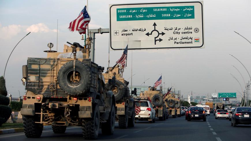 A convoy of U.S. vehicles is seen after withdrawing from northern Syria, in Erbil, Iraq October 21, 2019. REUTERS/Azad Lashkari - RC13EE9DCA60