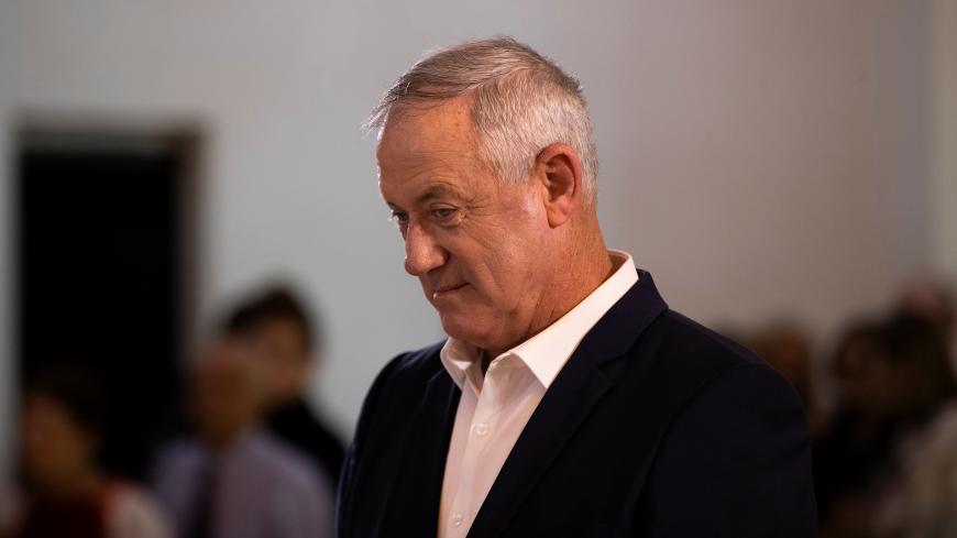 Benny Gantz, leader of Blue and White party pays his respect to former Supreme Court president Meir Shamgar who died on Saturday during a memorial ceremony held at the supreme court in Jerusalem October 22, 2019. REUTERS/Ronen Zvulun - RC1245A6F000