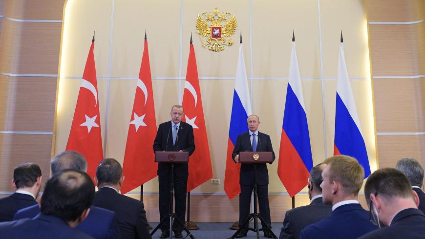 Russian President Vladimir Putin and Turkish President Tayyip Erdogan attend a news conference following their talks in Sochi, Russia October 22, 2019. Sputnik/Alexei Druzhinin/Kremlin via REUTERS  ATTENTION EDITORS - THIS IMAGE WAS PROVIDED BY A THIRD PARTY. - RC15BBB57CE0