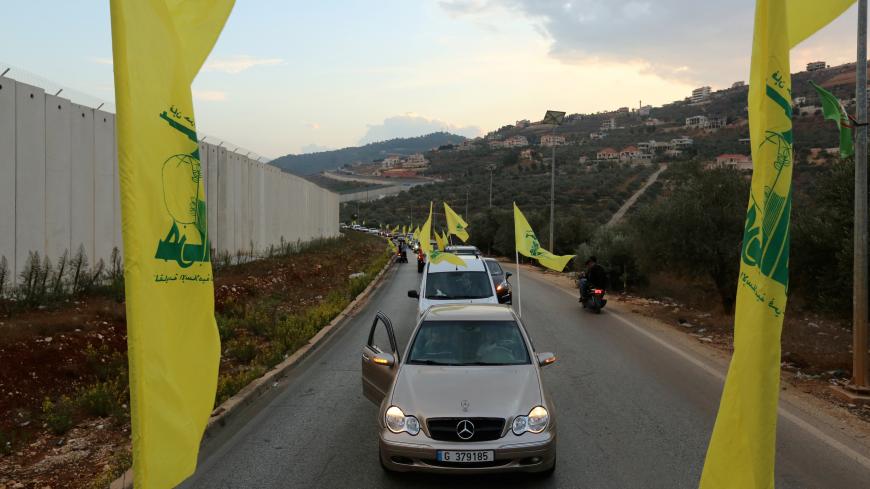Supporters of Lebanon's Hezbollah leader Sayyed Hassan Nasrallah ride in a convoy in the southern village of Kfar Kila, Lebanon October 25, 2019. REUTERS/Aziz Taher - RC1C5391F8B0