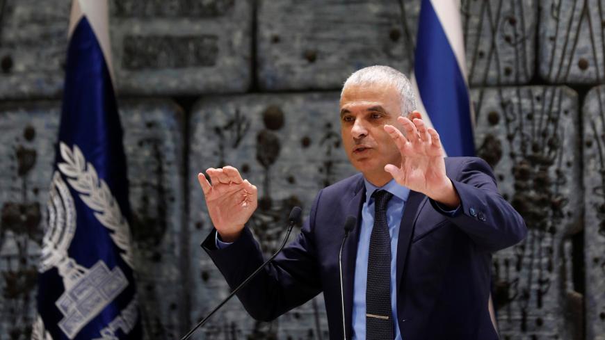 Israeli Finance Minister Moshe Kahlon speaks during a ceremony whereby Amir Yaron is sworn in as Bank of Israel governor by President Reuven Rivlin, in the presence of Prime Minister Benjamin Netanyahu, in Jerusalem December 24, 2018. REUTERS/Amir Cohen - RC1473F276D0