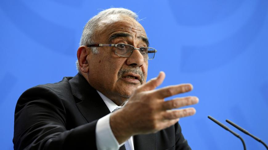 Iraqi Prime Minister Adil Abdul-Mahdi speaks during a news conference with German Chancellor Angela Merkel (not pictured) at the Chancellery in Berlin, Germany, April 30, 2019.  REUTERS/Annegret Hilse - RC1AE78313D0