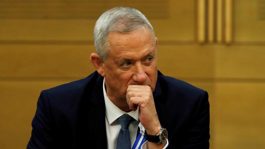 Benny Gantz, leader of Blue and White party looks on during his party faction meeting at the Knesset, Israel's parliament, in Jerusalem October 3, 2019. REUTERS/Ronen Zvulun - RC12E38F45B0