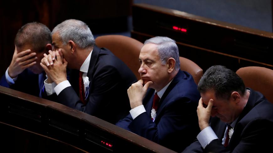 Israeli Prime Minister Benjamin Netanyahu attends the swearing-in ceremony of the 22nd Knesset, the Israeli parliament, in Jerusalem October 3, 2019. REUTERS/Ronen Zvulun - RC13F4927B00