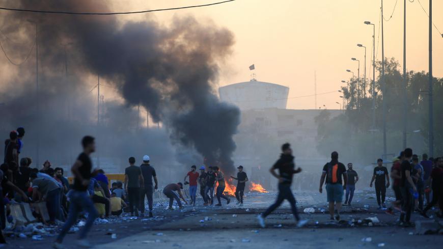 Demonstrators gather at a protest during a curfew, three days after the nationwide anti-government protests turned violent, in Baghdad, Iraq October 4, 2019. REUTERS/Alaa al-Marjani - RC19E6A9D5F0