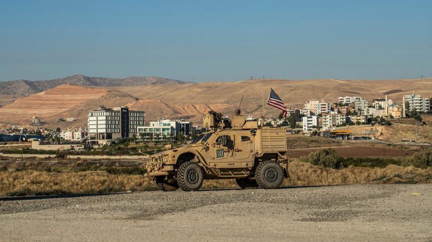 A US armoured vehicle patrols the village of Ein Diwar in Syria's northeastern Hasakeh province on November 4, 2019. (Photo by Delil SOULEIMAN / AFP) (Photo by DELIL SOULEIMAN/AFP via Getty Images)