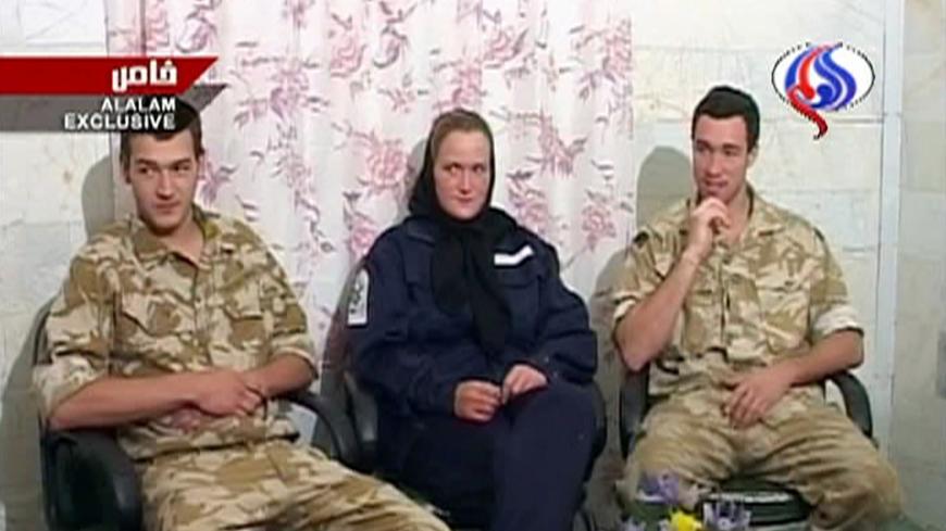 A frame grab from Iranian TV shows three of 15 captured British sailors and marines speaking on Iranian television March 30, 2007. Iranian television broadcast the footage of the three on Friday and said one had confessed to entering Iranian waters illegally and had apologised to the Iranian people.   REUTERS/Al Alam Television  (IRAN)   IRAN OUT - GM1DUXVBCMAA