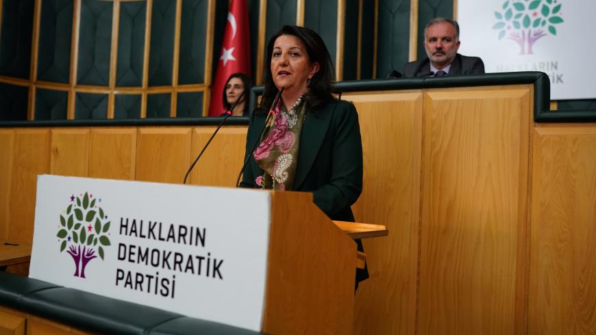 Pervin Buldan, co-leader of the pro-Kurdish Peoples' Democratic Party (HDP), speaks before starting a two-day hunger strike in support of jailed Kurdish lawmaker Leyla Guven's own hunger strike against the isolation of Kurdish rebel leader Abdullah Ocalan in prison, at the Turkish Parliament in Ankara, Turkey December 4, 2018. REUTERS/Umit Bektas - RC17525CE770
