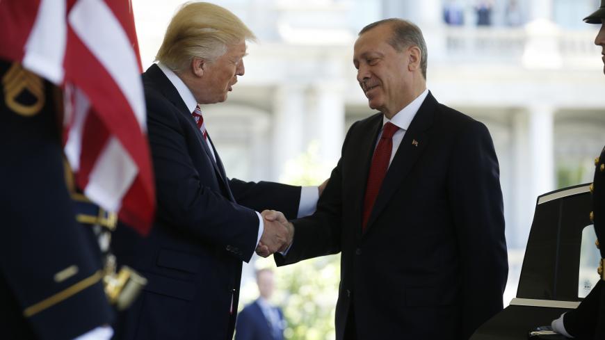 U.S President Donald Trump (L) welcomes Turkey's President Recep Tayyip Erdogan at the entrance to the West Wing of the White House in Washington, U.S. May 16, 2017. REUTERS/Joshua Roberts - HP1ED5G1AXJBA