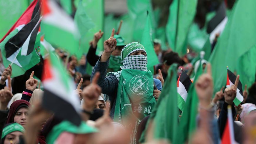 Palestinians take part in a rally marking the 31st anniversary of Hamas' founding, in Gaza City December 16, 2018. REUTERS/Ibraheem Abu Mustafa - RC1AF0B233A0