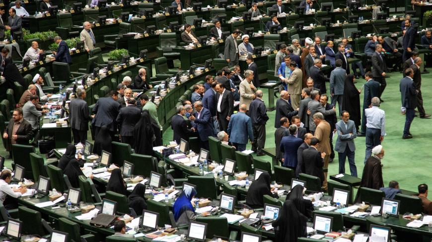 Iranian lawmakers attend a session of parliament in Tehran, Iran July 16, 2019. Nazanin Tabatabaee/WANA (West Asia News Agency) via REUTERS. ATTENTION EDITORS - THIS IMAGE HAS BEEN SUPPLIED BY A THIRD PARTY. - RC1120AED380