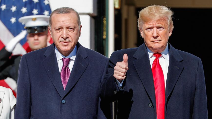 U.S. President Donald Trump welcomes Turkey's Pressident Tayyip Erdogan at the White House in Washington, U.S., November 13, 2019. REUTERS/Tom Brenner     TPX IMAGES OF THE DAY - RC2HAD9SK03C