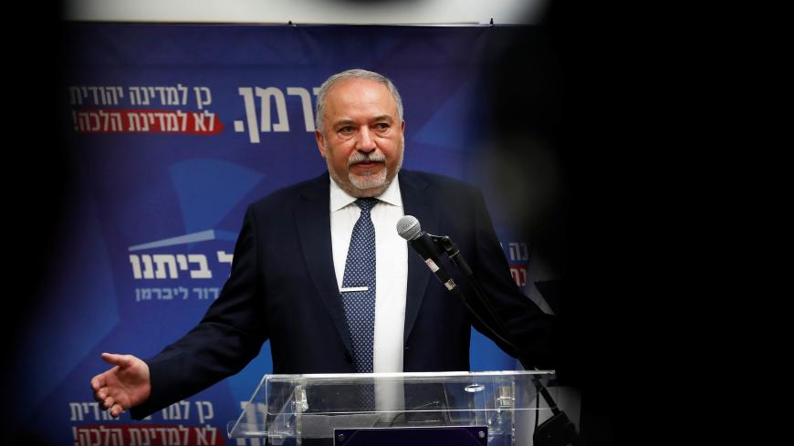 Avigdor Lieberman, head of the ultranationalist Yisrael Beitenu party delivers a statement at the Knesset, Israeli parliament, in Jerusalem November 20, 2019. REUTERS/Ronen Zvulun - RC2ZED9OQ503