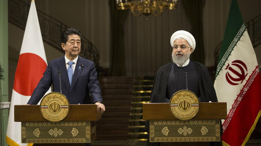 TEHRAN, June 13, 2019 -- Japanese Prime Minister Shinzo Abe L and Iranian President Hassan Rouhani attend a joint press conference in Tehran, Iran, June 12, 2019. Iranian President Hassan Rouhani said on Wednesday that the Islamic republic welcomes Japan's efforts for the development of mutual ties as well as regional and international cooperation. (Photo by Ahmad Halabisaz/Xinhua via Getty) (Xinhua/Ahmad Halabisaz via Getty Images)