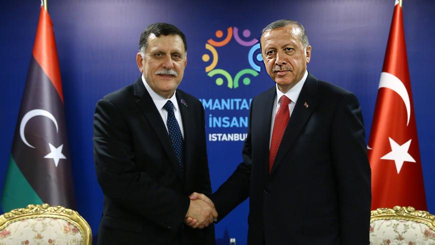 ISTANBUL, TURKEY - MAY 24 :  Turkish President Recep Tayyip Erdogan (R) meets with the Chairman of the Presidential Council of Libya Fayez Mustafa al-Sarraj (L) during a bilateral meeting, held within the World Humanitarian Summit in Istanbul, Turkey on May 24, 2016. (Photo by Kayhan Ozer/Anadolu Agency/Getty Images)