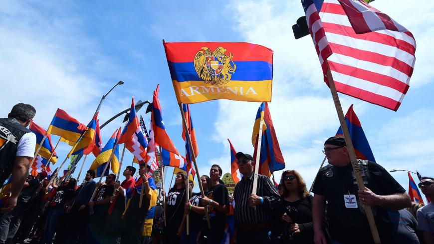 Armenian-Americans march in protest through the Little Armenia neighborhood of Hollywood, California on April 24, 2018 demanding recognition by Turkey on the 103rd anniversary of the 1915 Armenian genocide, which Turkey insists did not happen. (Photo by FREDERIC J. BROWN / AFP)        (Photo credit should read FREDERIC J. BROWN/AFP via Getty Images)