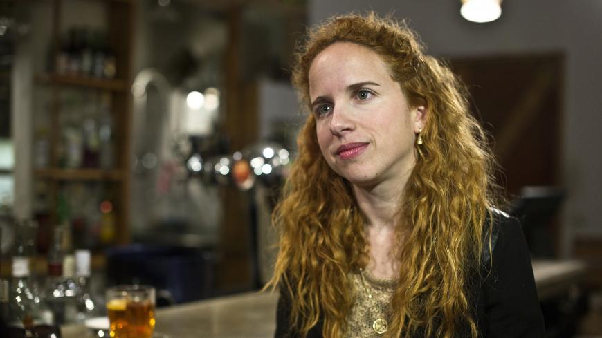 Israeli legislator Stav Shaffir poses for a photograph in Tel Aviv February 15, 2015. Whether on the left, in the centre or on the right of the spectrum, women are filling senior positions in Israel's major parties, influencing the style, tone and manner of politics, even if it remains a tough-talking game. On the left of the spectrum there is Shaffir, 29, who was the youngest woman to serve in the Israeli parliament when she was first elected in 2013. A former leader of the social protests that took over T