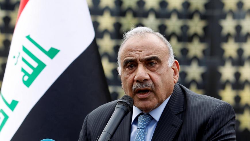 Iraqi Prime Minister Adel Abdul Mahdi speaks during a symbolic funeral ceremony of Major General Ali al-Lami, who commands the Iraqi Federal Police's Fourth Division, who was killed in Salahuddin, in Baghdad, Iraq October 23, 2019. REUTERS/Khalid al-Mousily - RC13E6661570