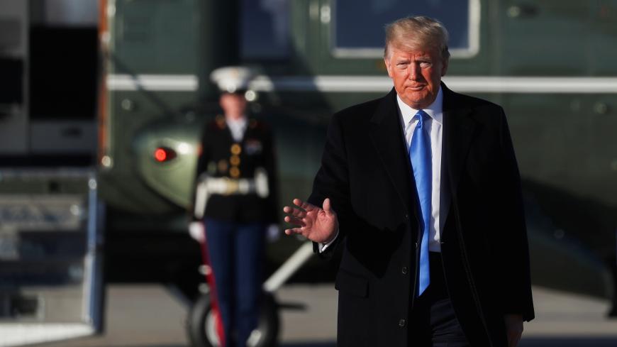 U.S. President Donald Trump waves as he walks from the Marine One helicopter to board Air Force One and depart Washington for a day and evening trip to Florida from Joint Base Andrews, Maryland, U.S., December 7, 2019. REUTERS/Loren Elliott - RC2KQD97NVV8