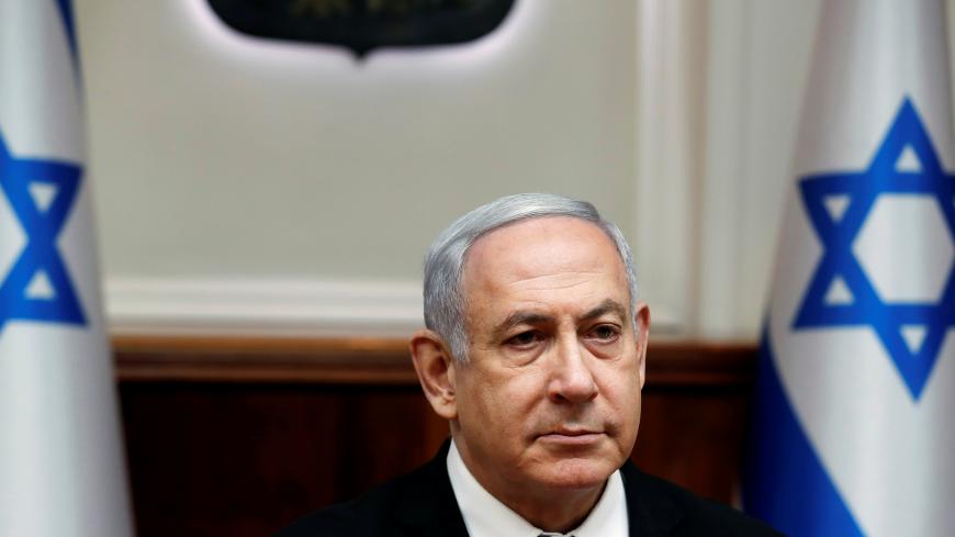 Israeli Prime Minister Benjamin Netanyahu attends the weekly cabinet meeting in Jerusalem December 8, 2019. REUTERS/Ronen Zvulun - RC2ZQD9CG4UT